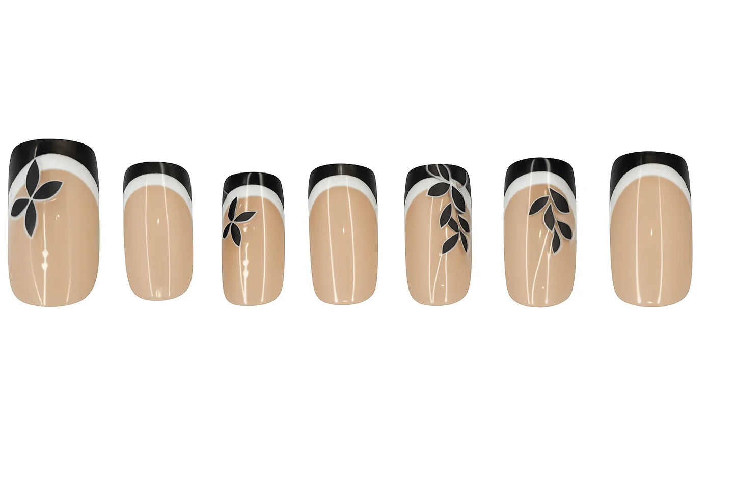 Nude press-on nails with black French tips and black floral leaf designs