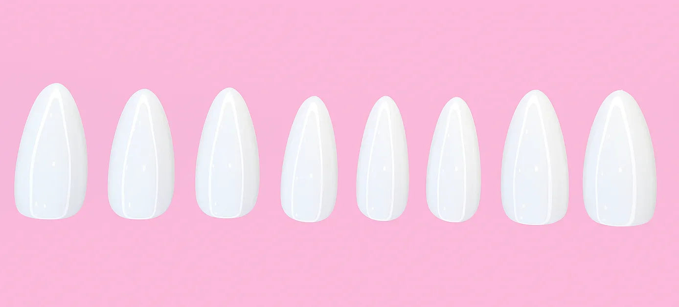 Glossy white press on nails set on pink background, coffin shape false nails