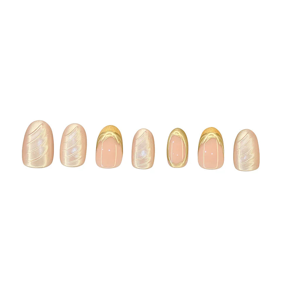 Set of nude and gold press on nails with metallic swirl and marble designs