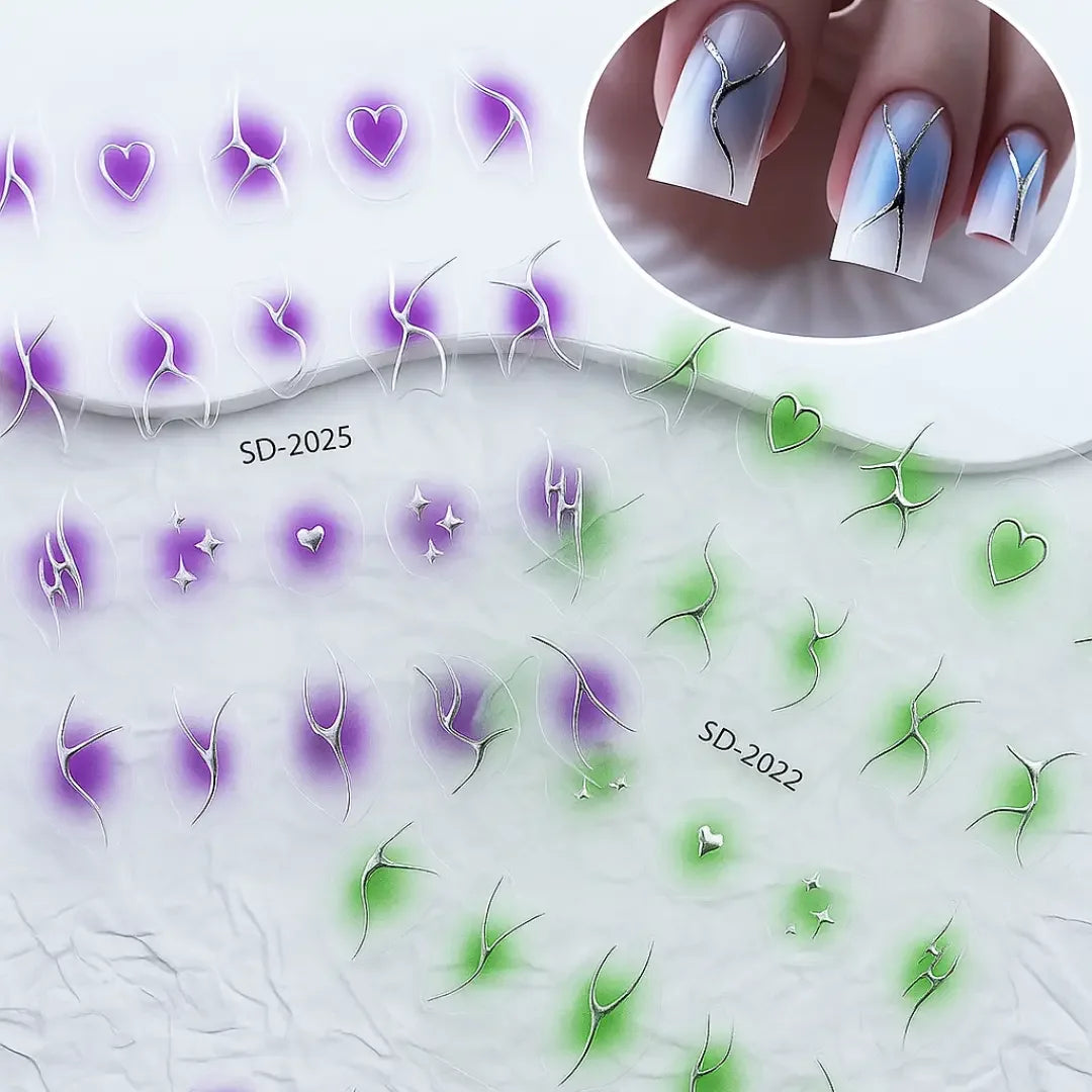 Aura flame nail stickers with purple and green abstract and heart designs, shown on sample nails.