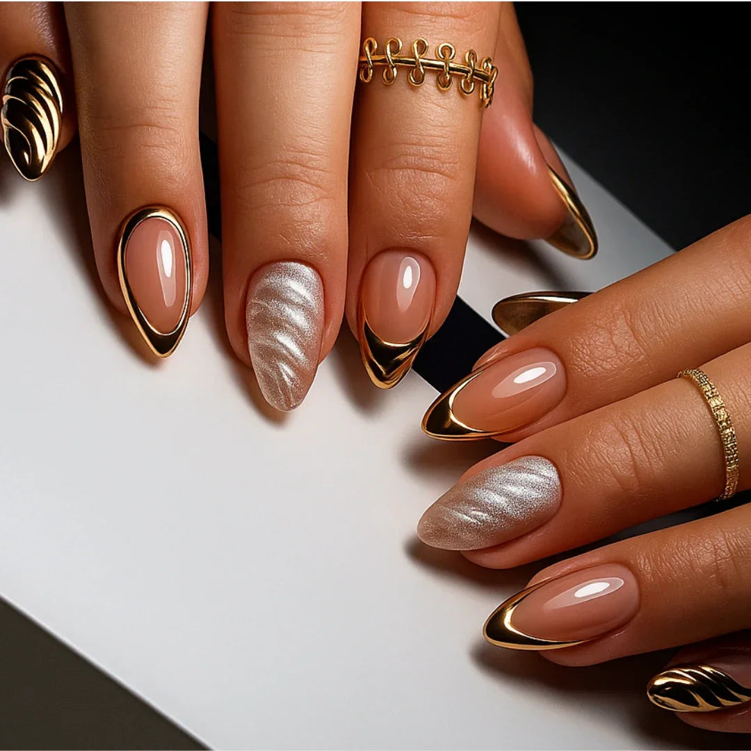 Luxury gold chrome nails with nude base and metallic tips, elegant manicure design