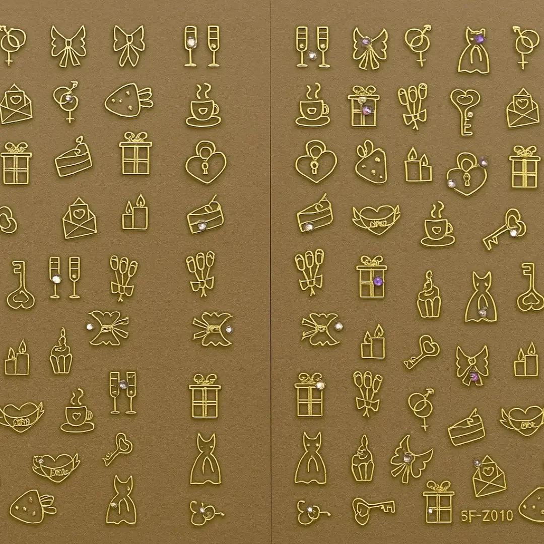 Gold romantic charm nail art stickers with hearts, gifts, dresses, and bows on a brown background